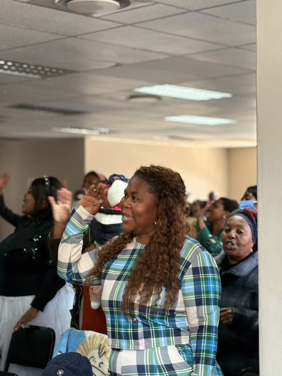 A member of the congregation worshipping